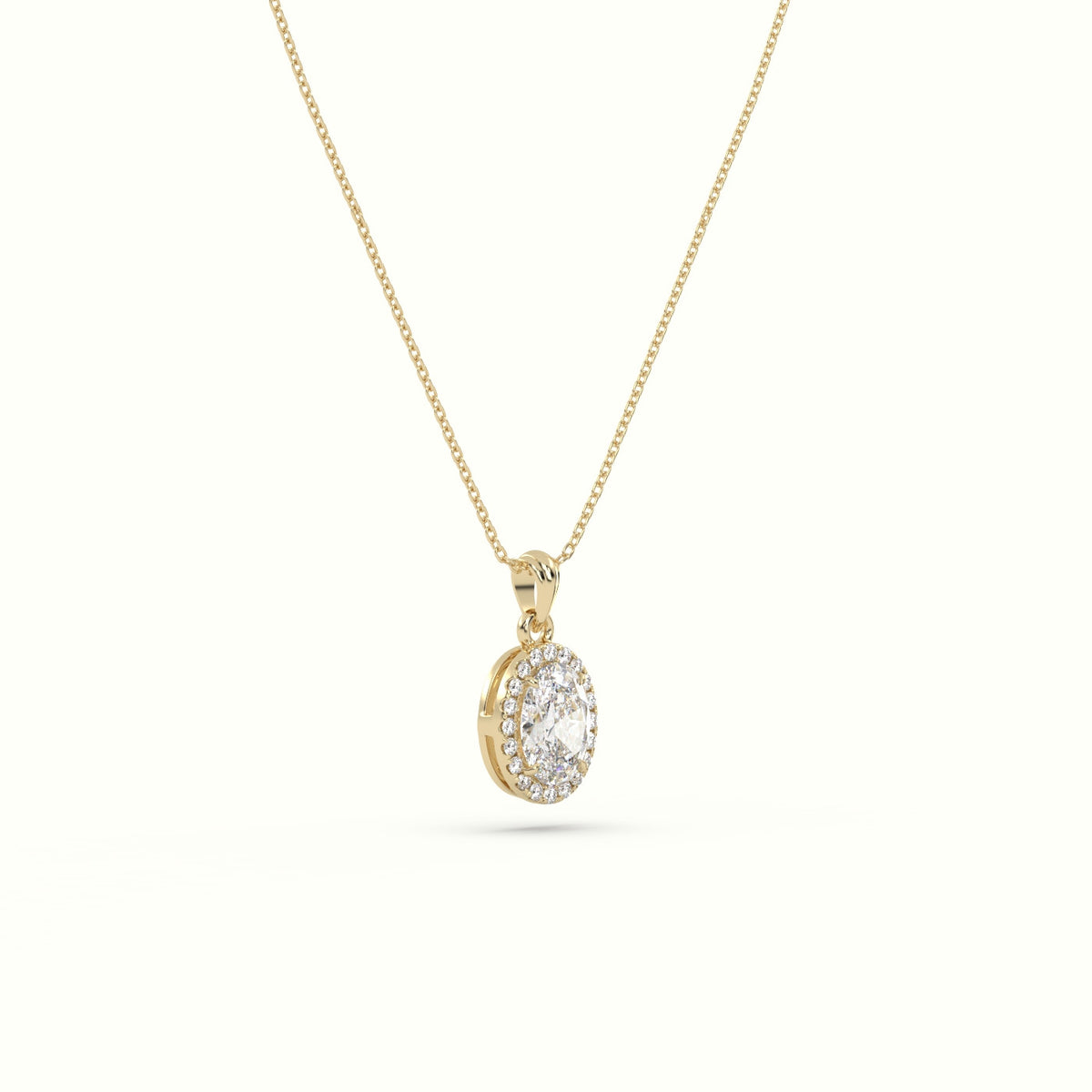 Oval Cut Solitaire Halo Diamond Pendant — Yellow Gold