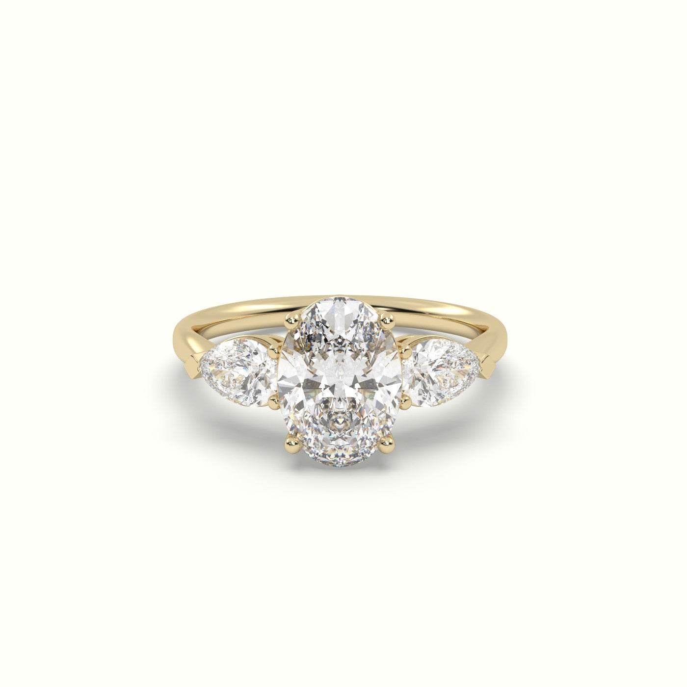 Oval Diamond 4 Round Prongs Trilogy Ring Pear Shape Side Stone | Precious Jewels Antwerp — Yellow Gold