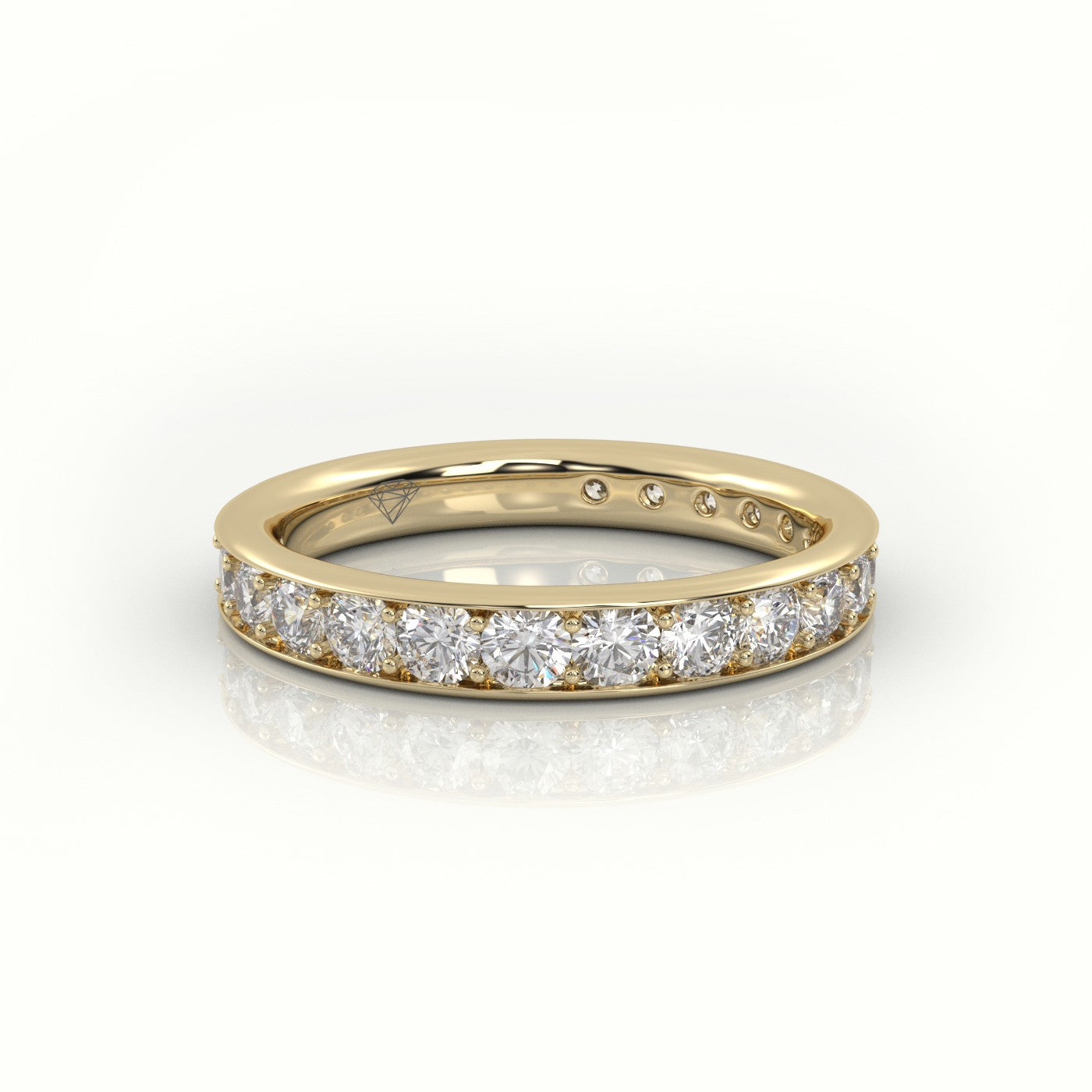 Round Cut Channel Set Eternity Band — Yellow Gold