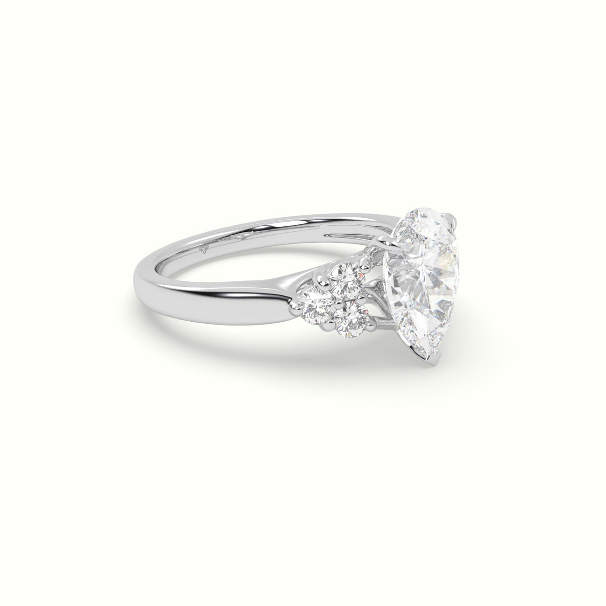 Pear Cut Diamond Side Stone Engagement Ring — White Gold