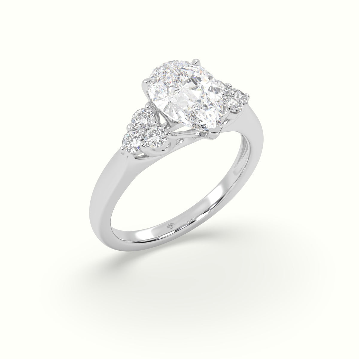 Pear Cut Diamond Side Stone Engagement Ring — White Gold