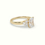 Radiant Cut Diamond Side Stone Engagement Ring — Yellow Gold