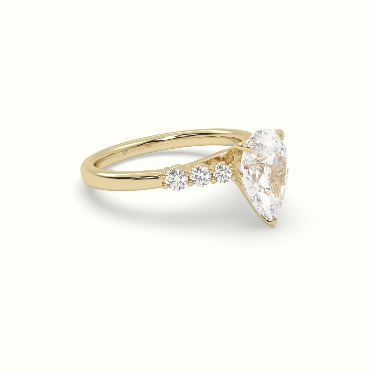Pear Cut Diamond Engagement Ring With Side Stones — Yellow Gold
