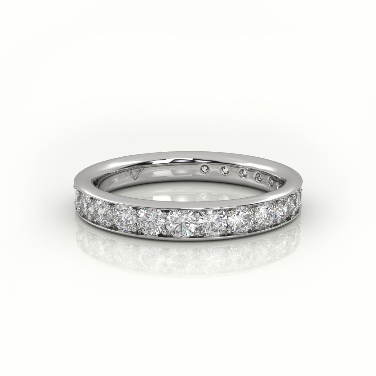 Round Cut Channel Set Eternity Band — White Gold