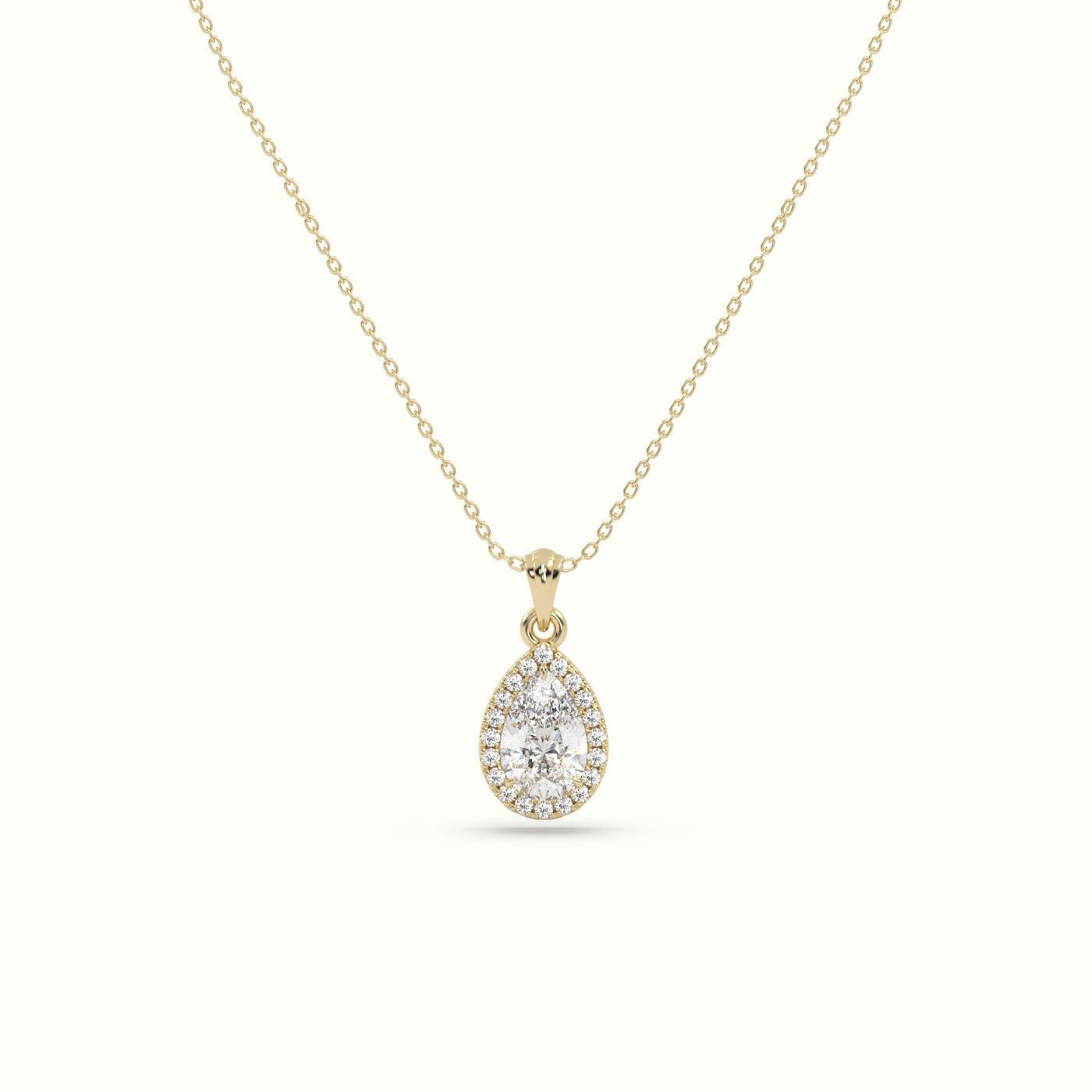 Pear Cut Solitaire Halo Diamond Pendant — Yellow Gold