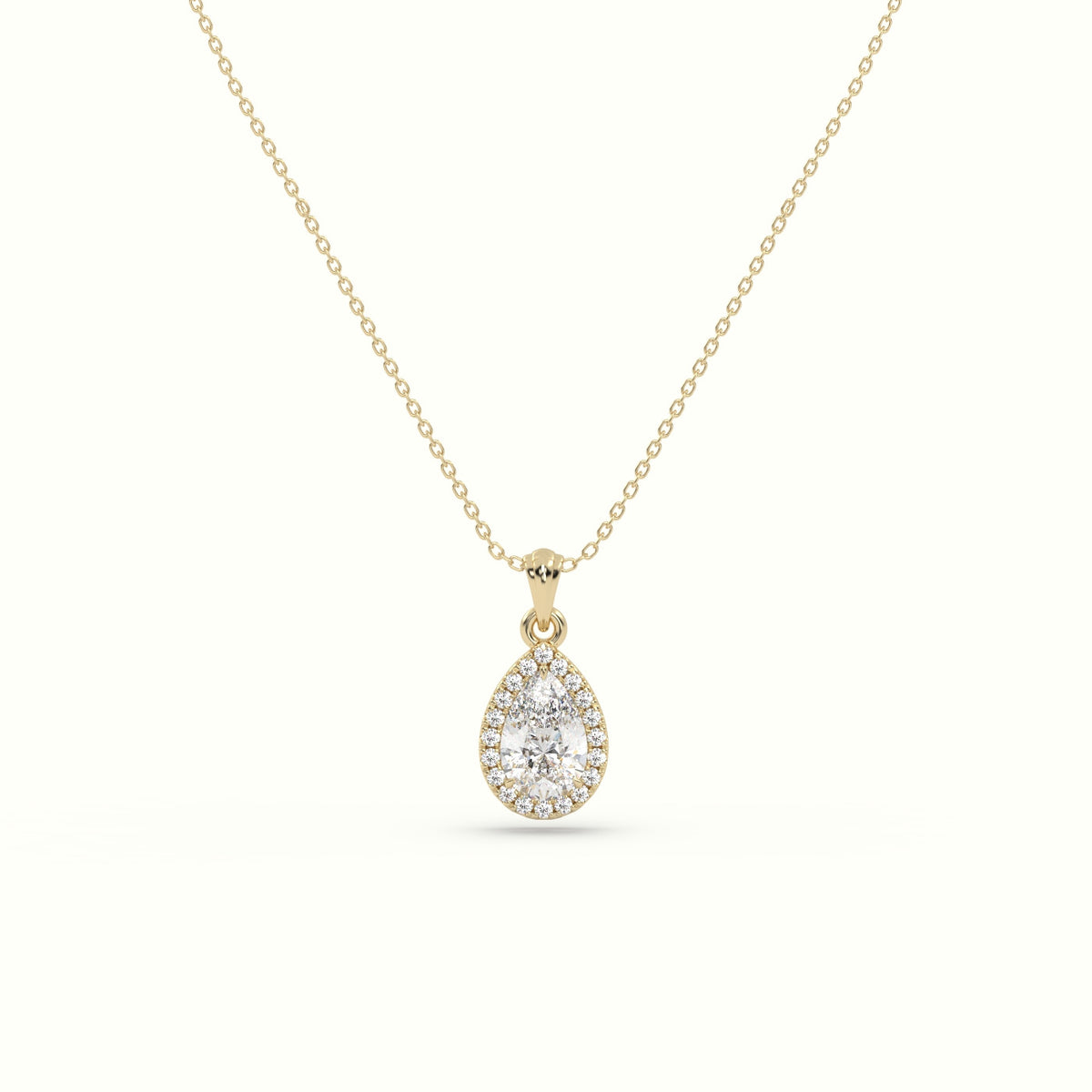 Pear Cut Solitaire Halo Diamond Pendant — Yellow Gold