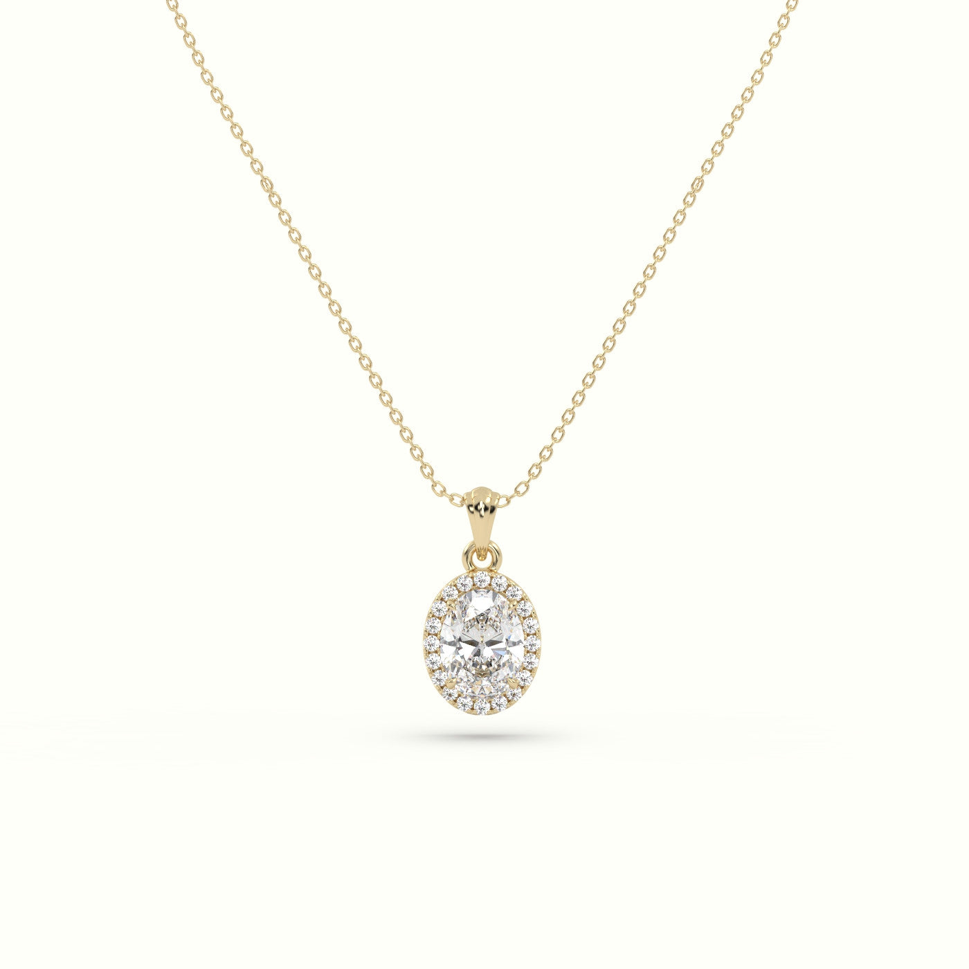 Oval Cut Solitaire Halo Diamond Pendant — Yellow Gold