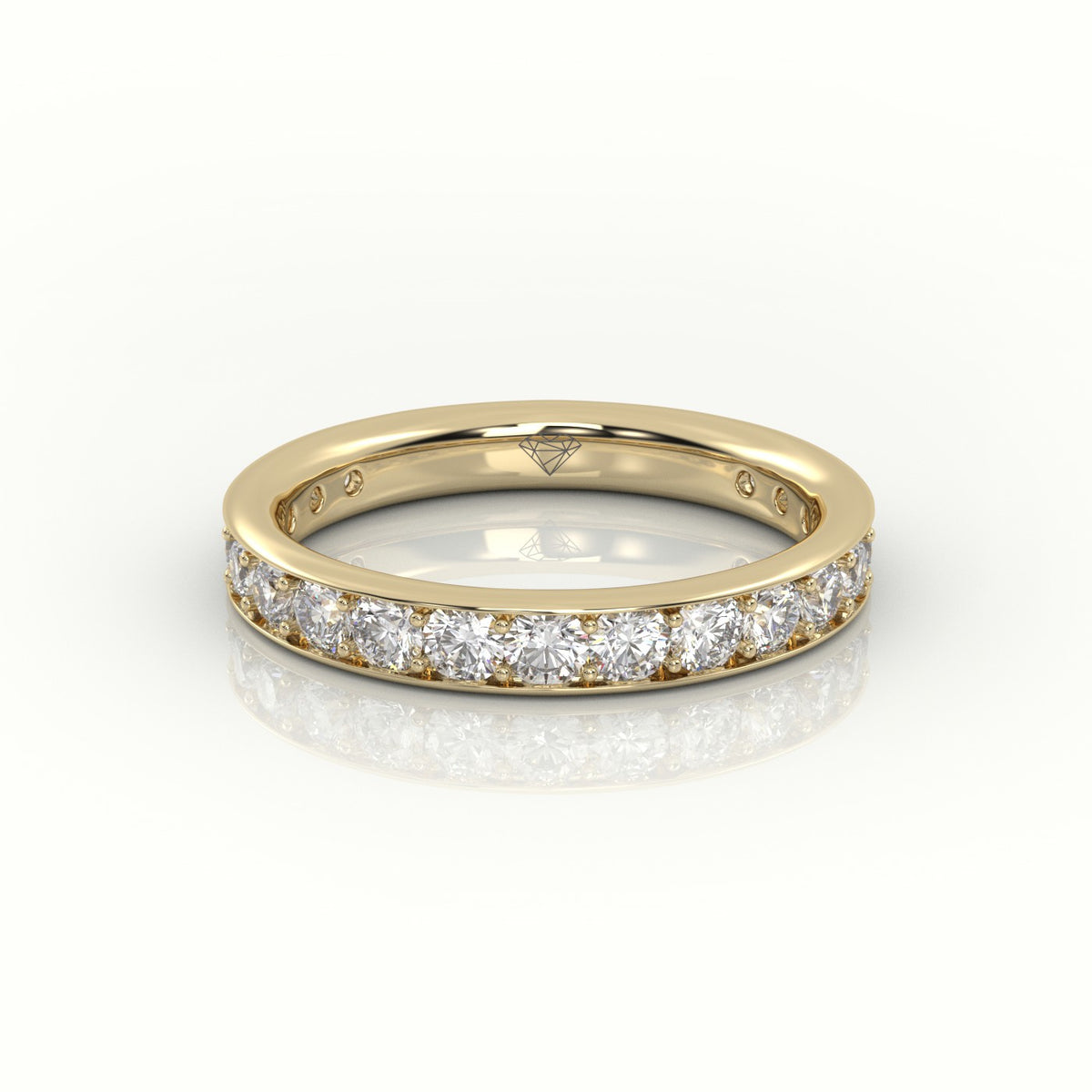 Round Cut Channel Set Eternity Band — Yellow Gold