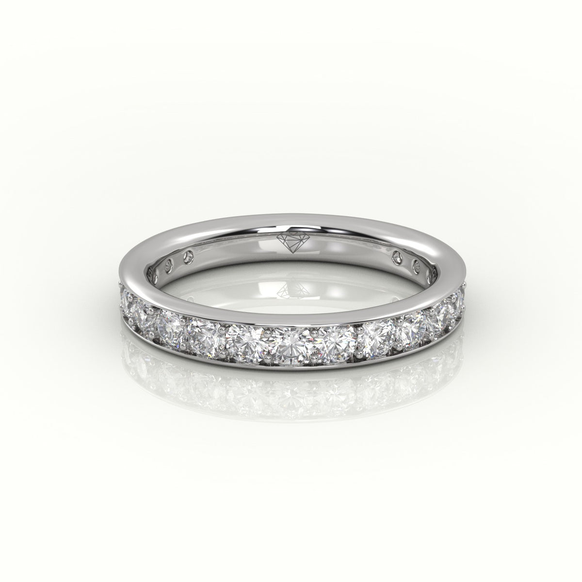 Round Cut Channel Set Eternity Band — White Gold