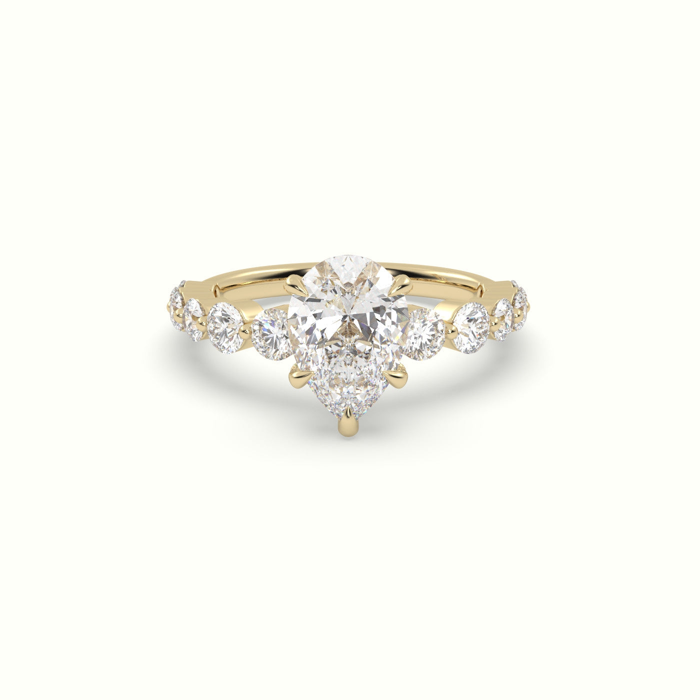 Pear Cut Diamond Engagement Ring With Side Stones — Yellow Gold
