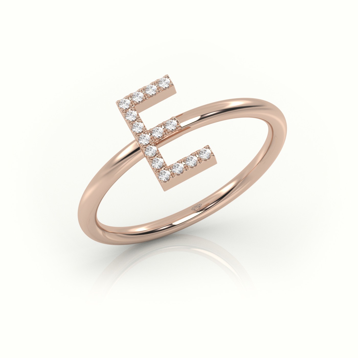 18k rose gold  round cut diamonds “e” initials monogram alphabet ring Photos & images