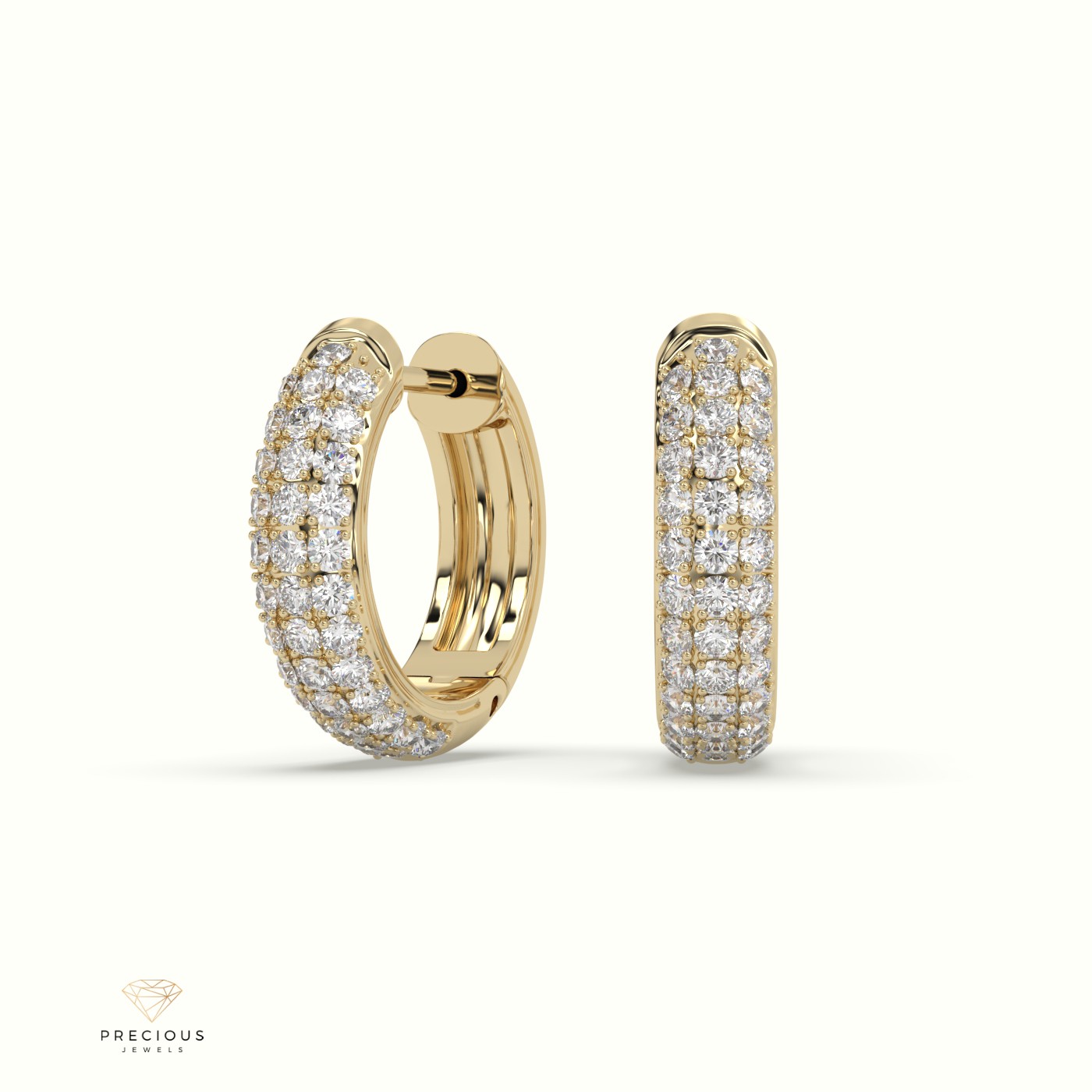 18k yellow gold petite triple row diamond huggie earrings.