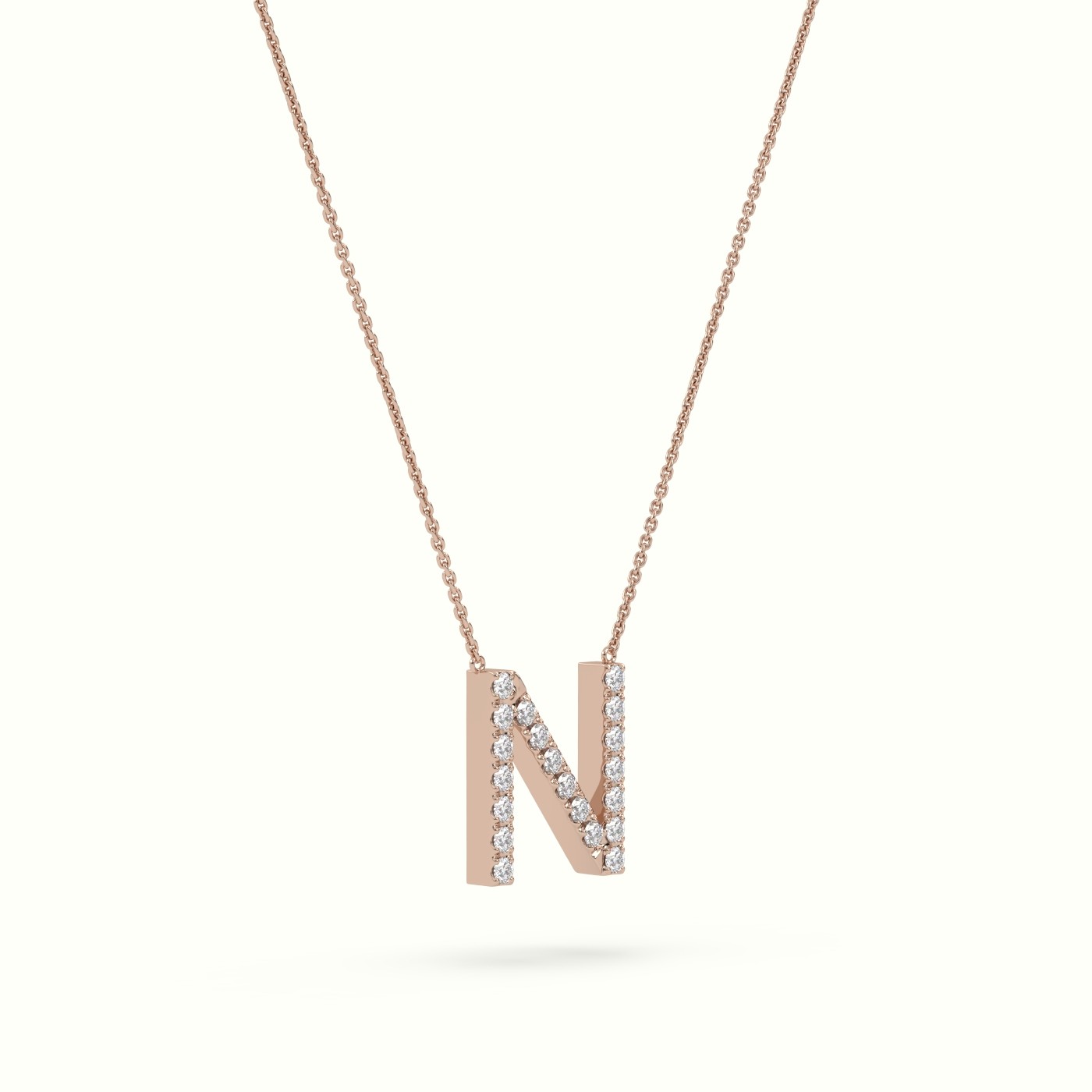 18k rose gold  round cut diamonds “n” initials monogram alphabet pendant Photos & images