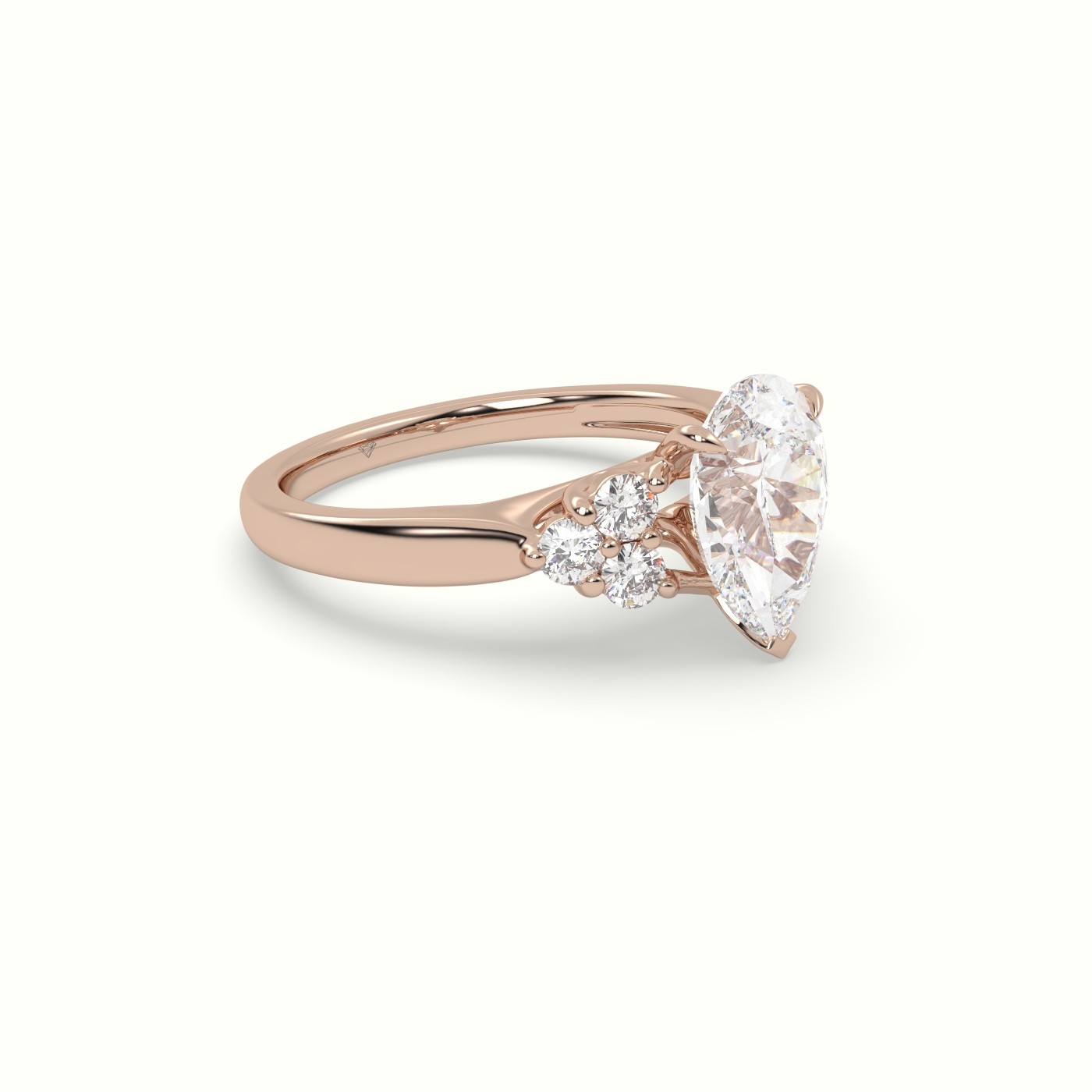 18K Rose Gold Pear Cut Diamond Side Stone Engagement Ring