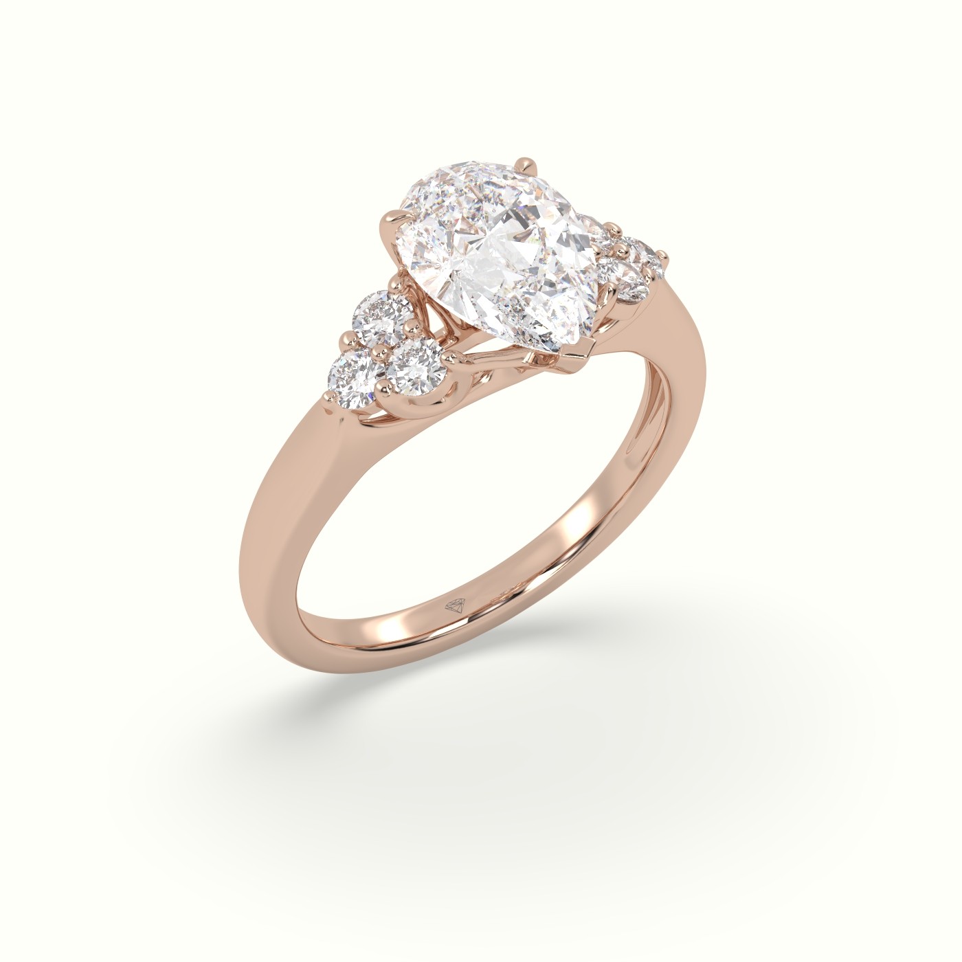 18K Rose Gold Pear Cut Diamond Side Stone Engagement Ring