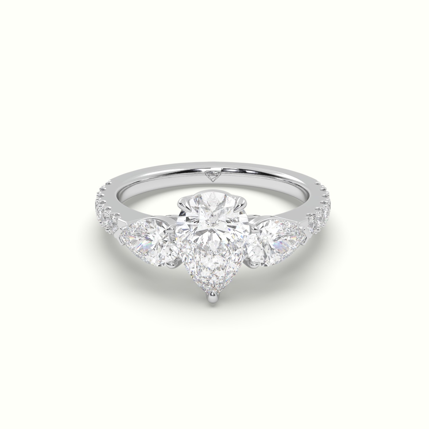 10K WHITE GOLD PEAR-SHAPED TRILOGY DIAMOND RING