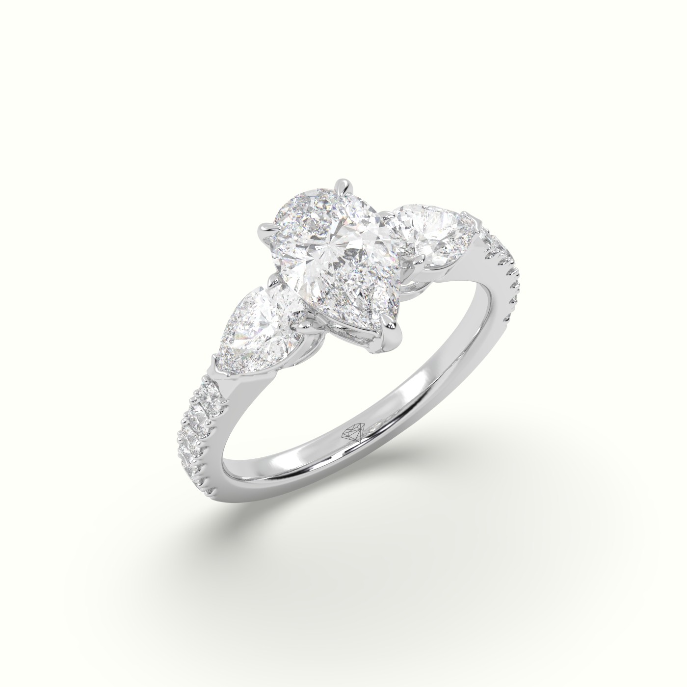 10K WHITE GOLD PEAR-SHAPED TRILOGY DIAMOND RING