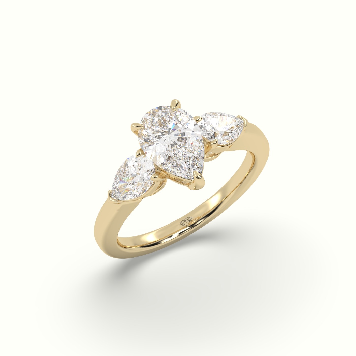 10K Yellow Gold Pear Diamond Trilogy Ring | Classic Luxury