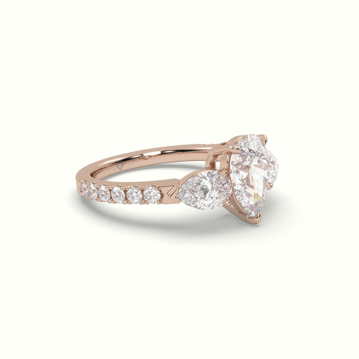 10K ROSE GOLD PEAR-SHAPED TRILOGY DIAMOND RING