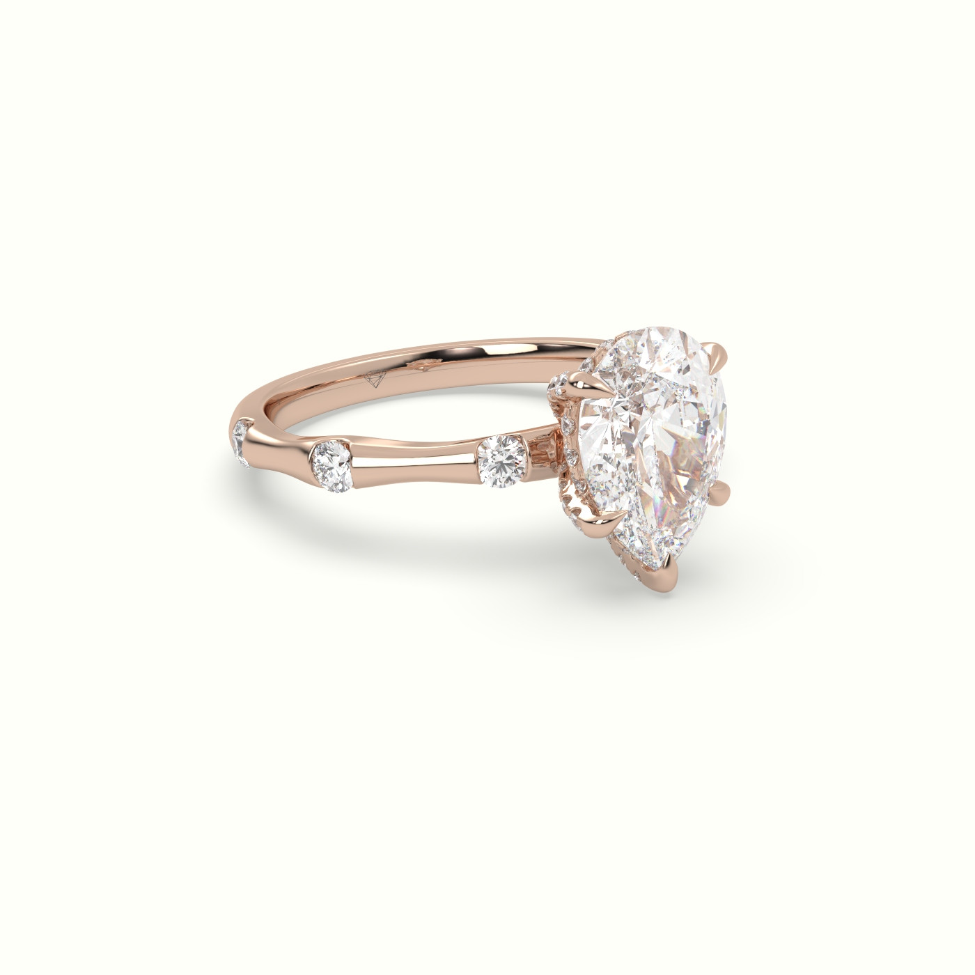 10K Rose Gold Pear Diamond Side Stone Engagement Ring